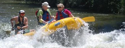 Couple rafting taggart falls