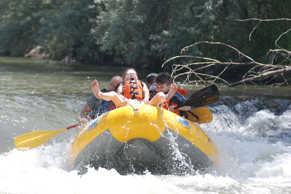 Little Girl Front Of Raft Excited in Weber Rapid