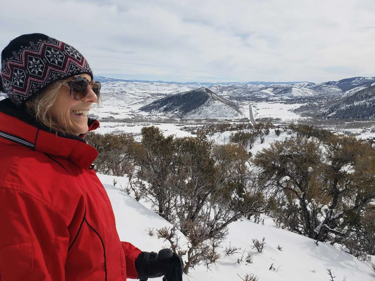 Woman snowshoe view